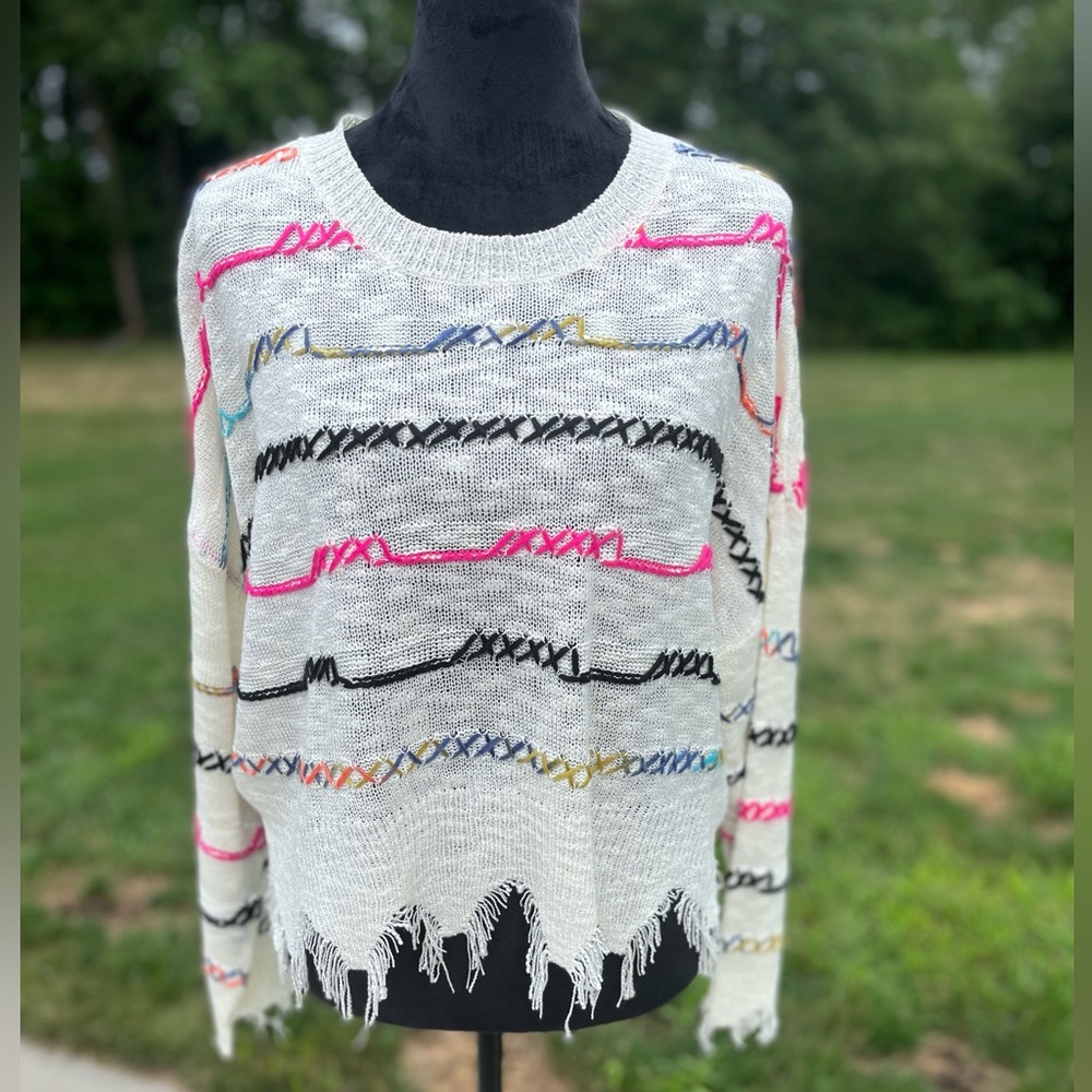 NWT. Boutique brand Wild Honey.Women’s size Med. White w/ multi-colored stripes.